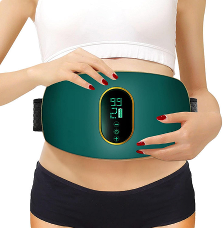Person using a green waist trimmer with digital display on a white background